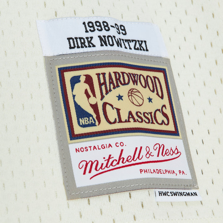 DALLAS MAVERICKS MITCHELL & NESS 2022 HARDWOOD CLASSIC DIRK NOWITZKI CREAM SWINGMAN JERSEY